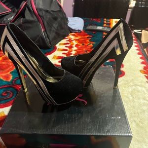 Black and gold high heels